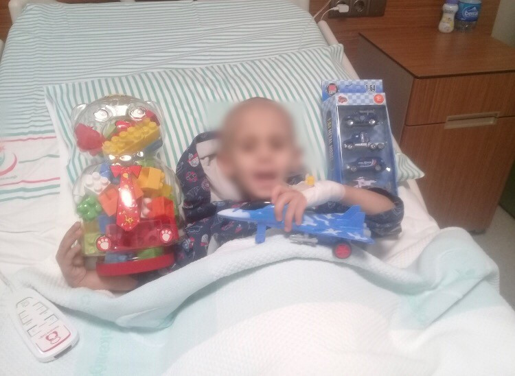 A child suffers from bowel cancer.