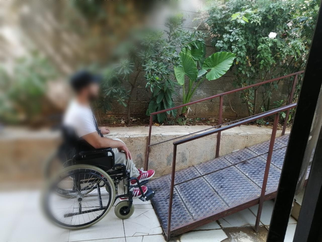 A young man suffers from paralysis and diseases