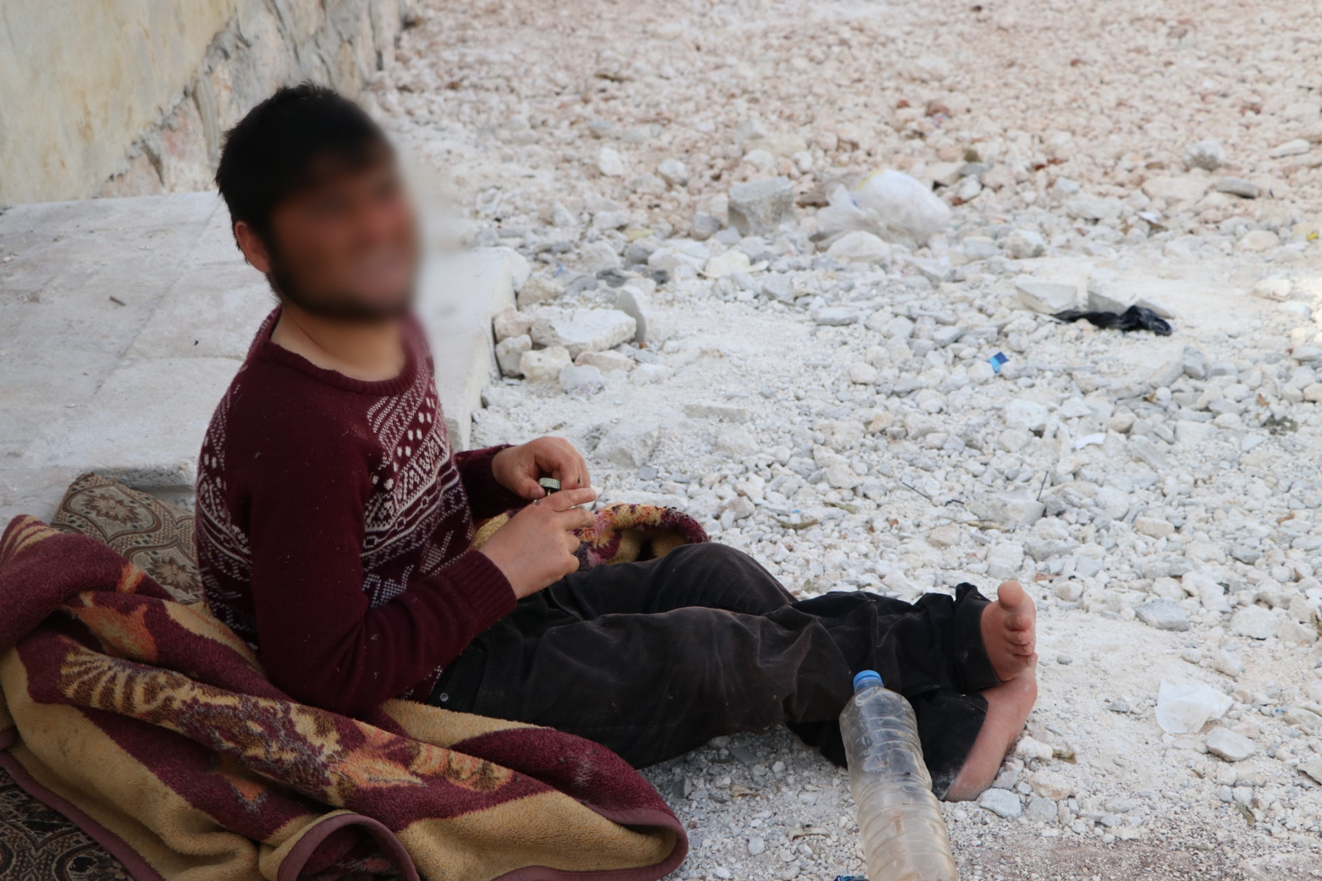 A displaced mother responsible for three ailing children