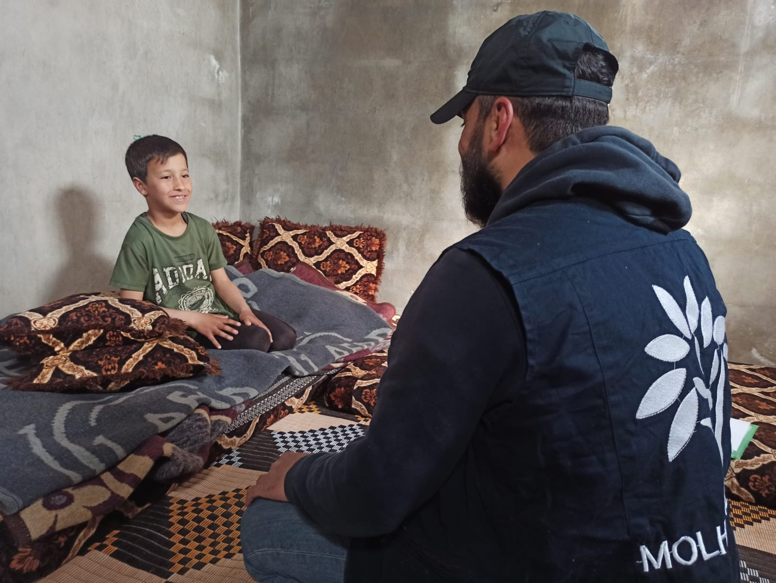 Stand with Hamida and Her Son