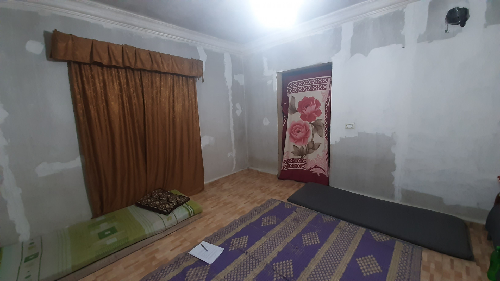 Hussein is an injured man lives in one room with his family