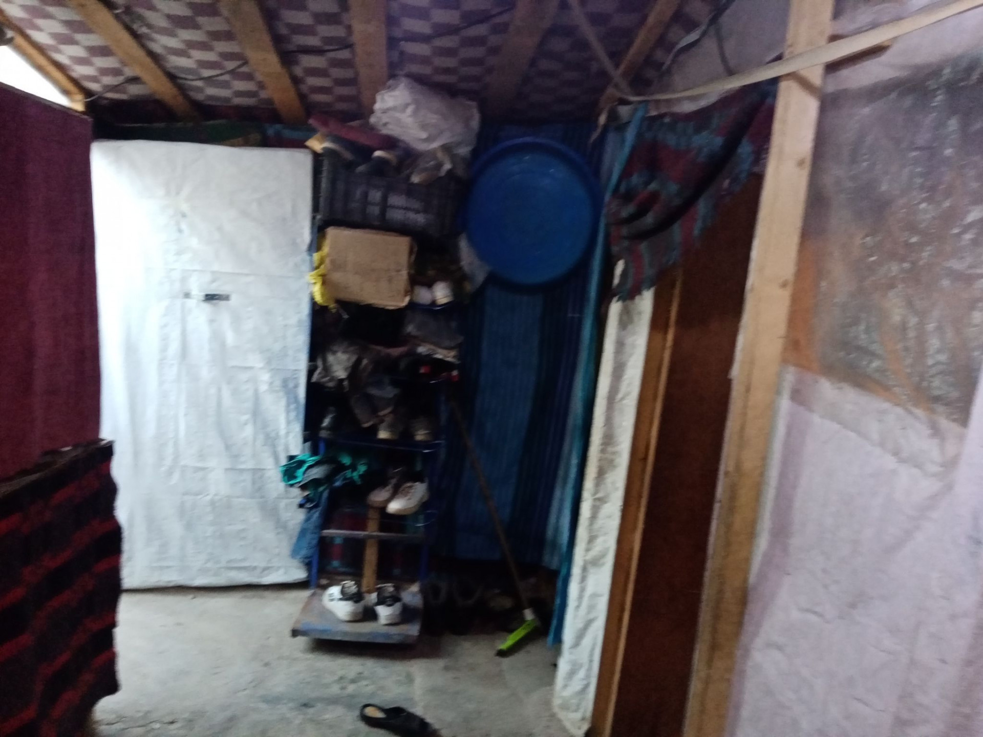 A family suffering from both displacement and their daughter hearing impaired