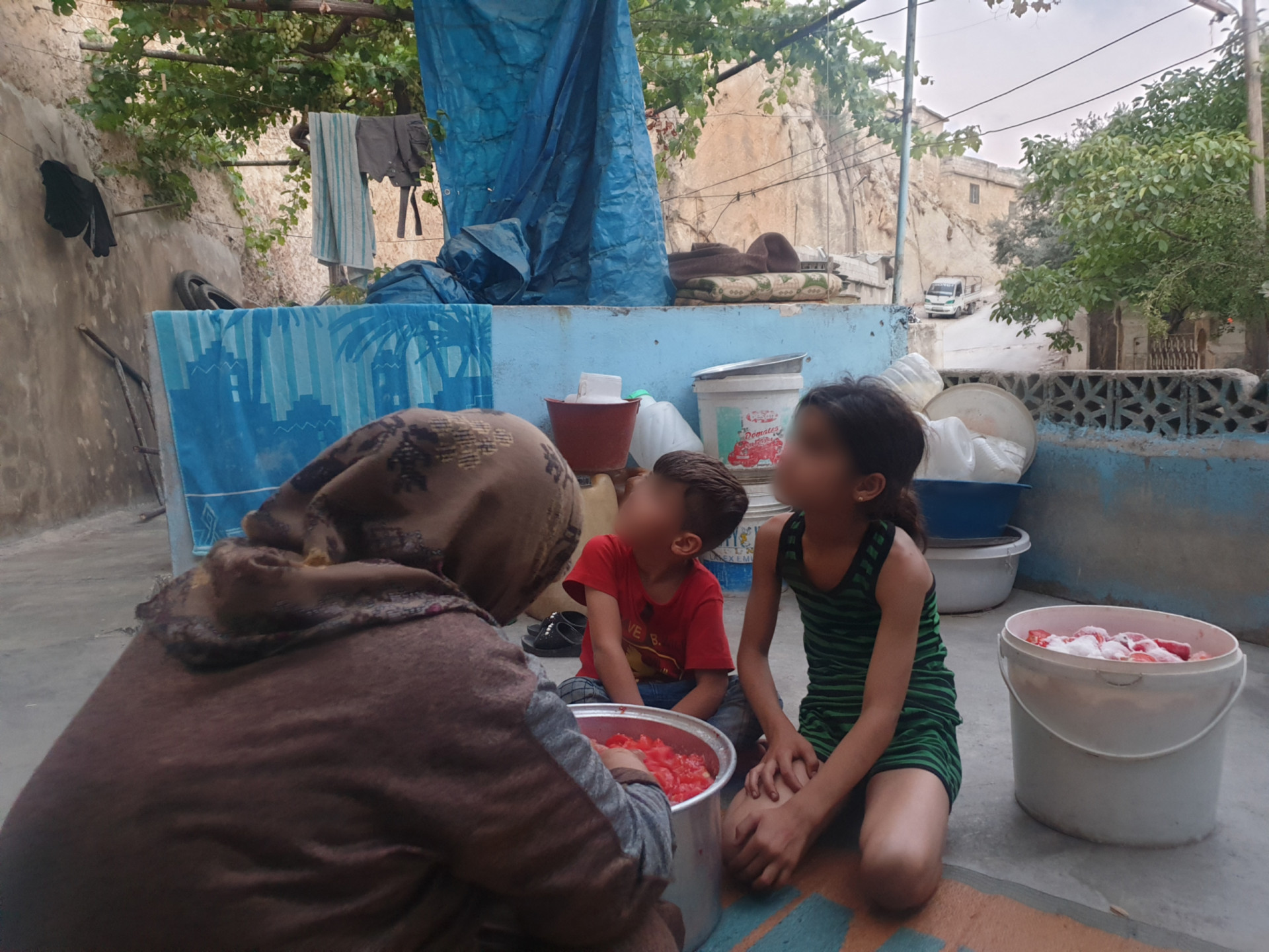 An old woman responsible for her orphan grandchildren