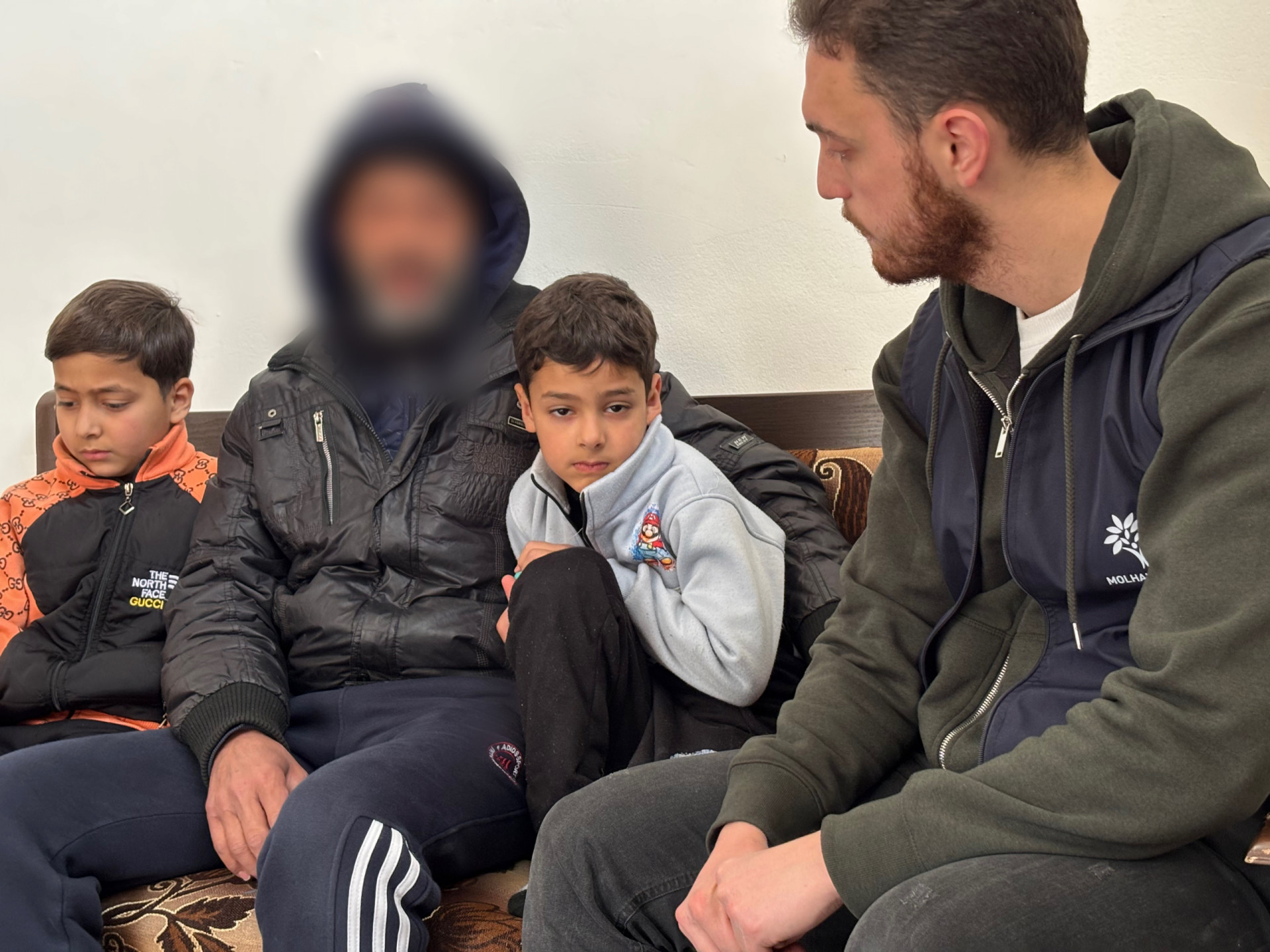 The pain of Saydnaya is still with him.