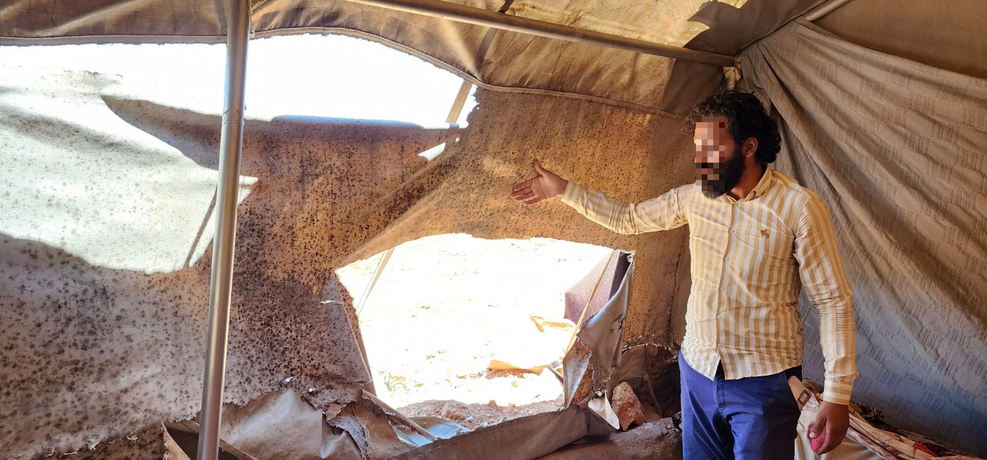 Ahmed is the father of a family that lives in a torn tent and they need your support