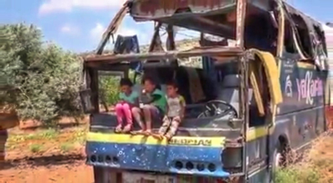 A family lived in a bus then in a door-less shelter!