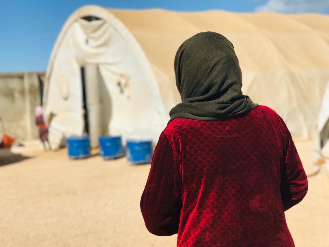 A displaced family needs a tent