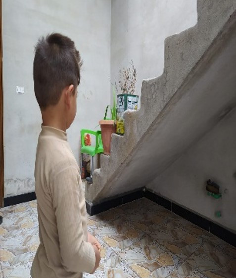 An orphan from Ar-Raqqa