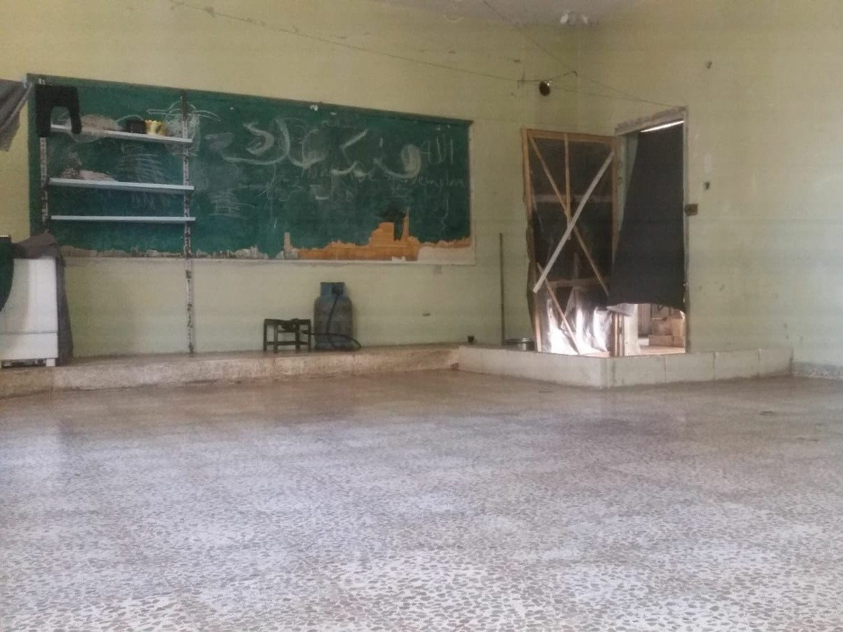 Isra'a lives in a school