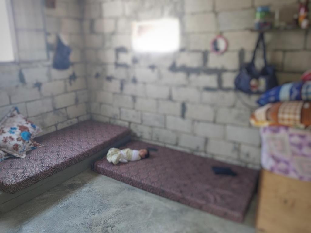 Maha lives in miserable conditions with her children.