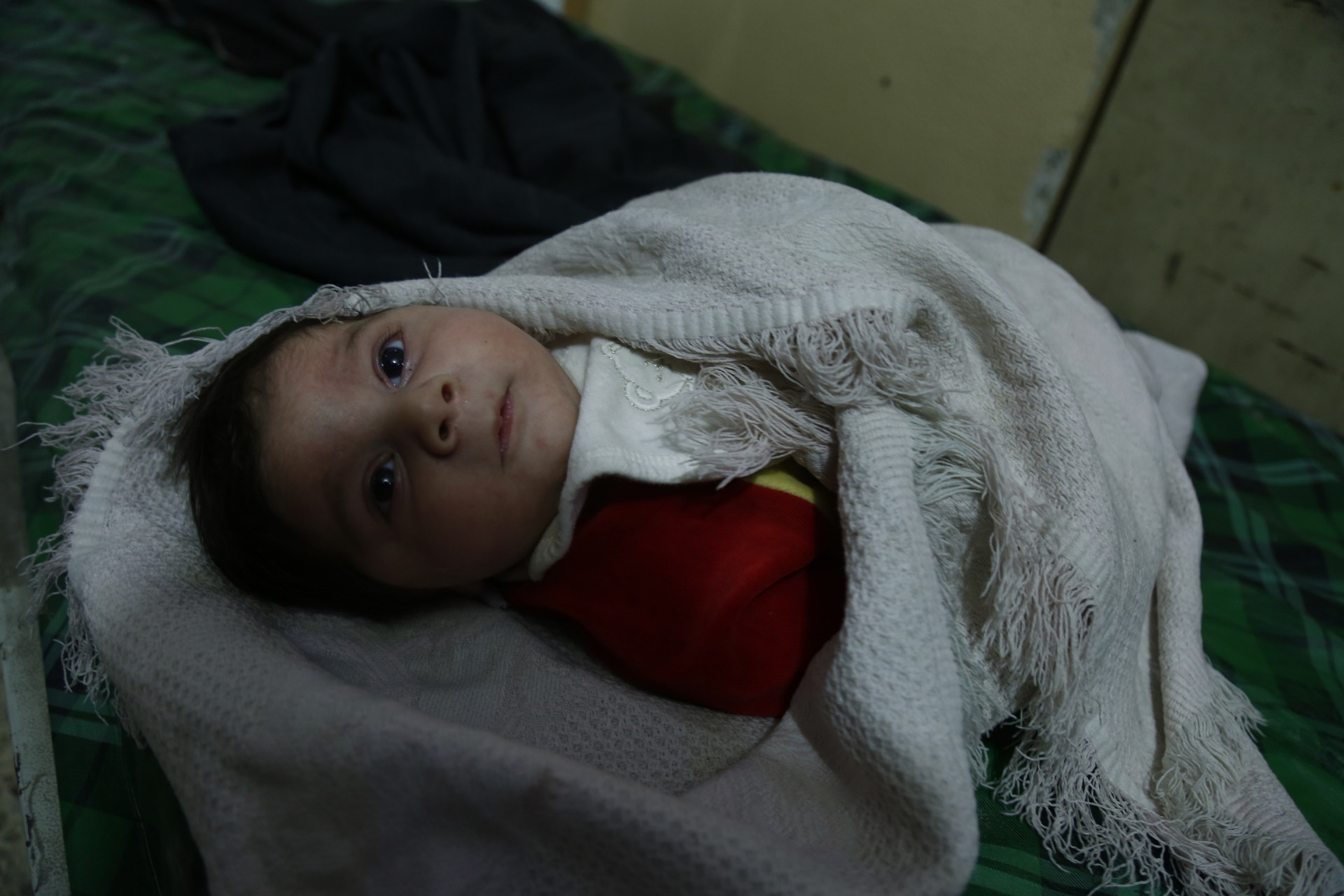 An Infant in Need of Milk and Baby Supplies