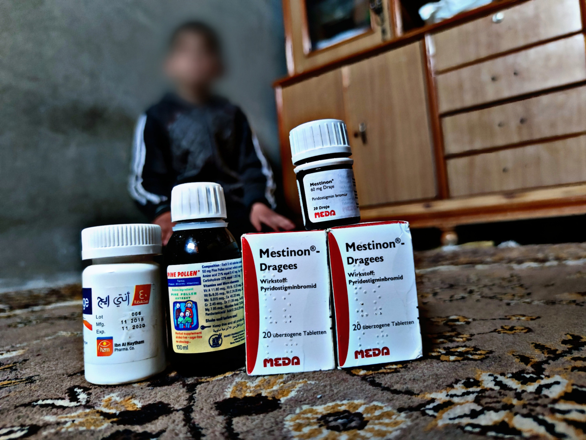 A child suffering from myasthenia gravis is in dire need of medication