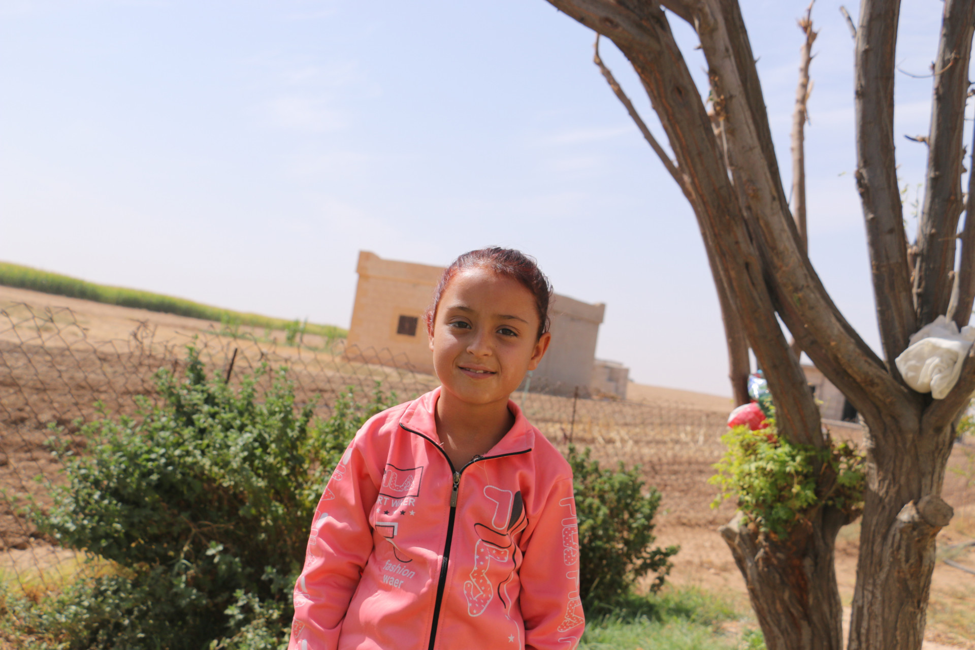 Amani is an orphan girl from Tal-Abyad